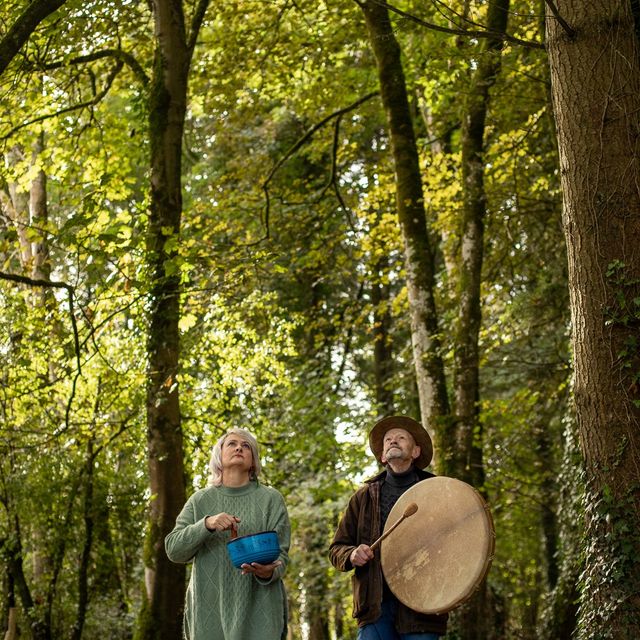 Robbie and Margot in a forest