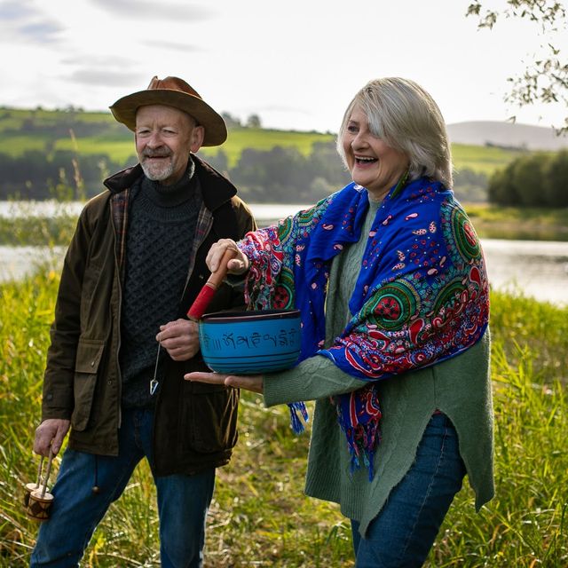 Margot and Robbie Ussher and partner conducting outside therapy